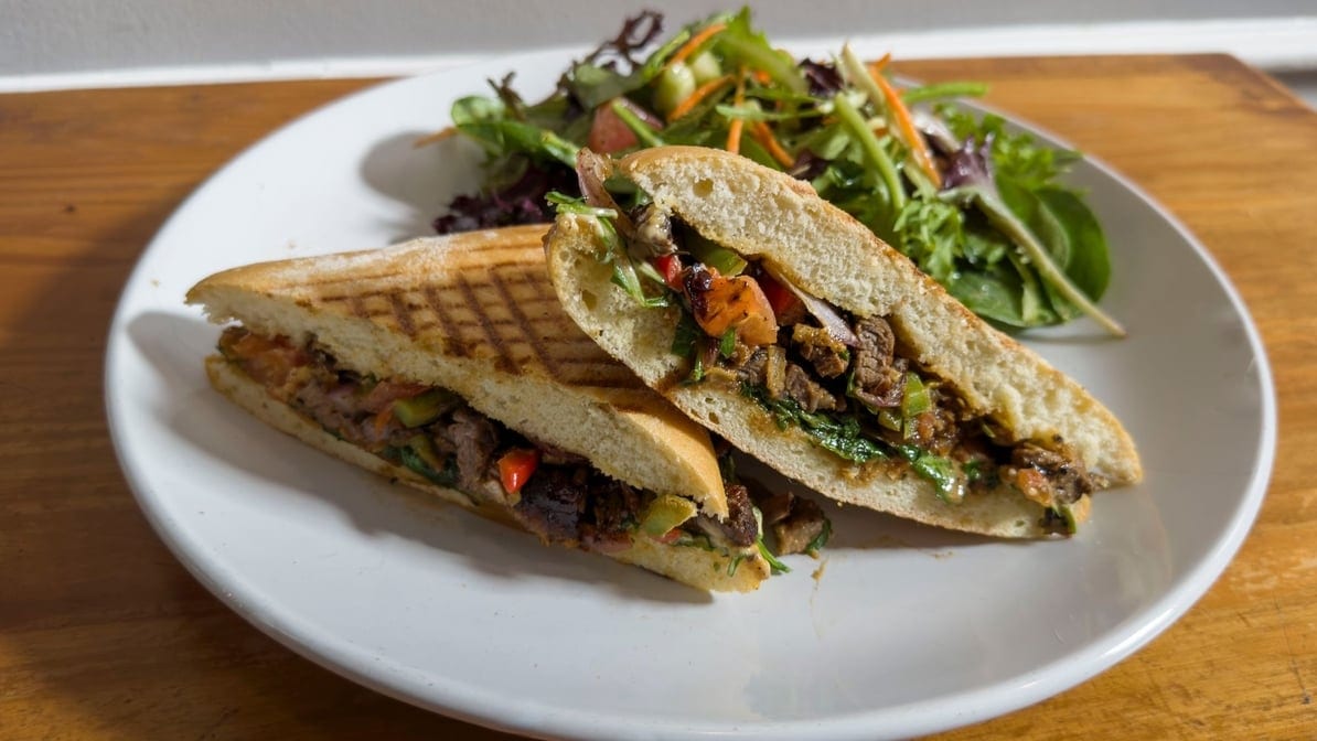 Lomo Saltado Sandwich.